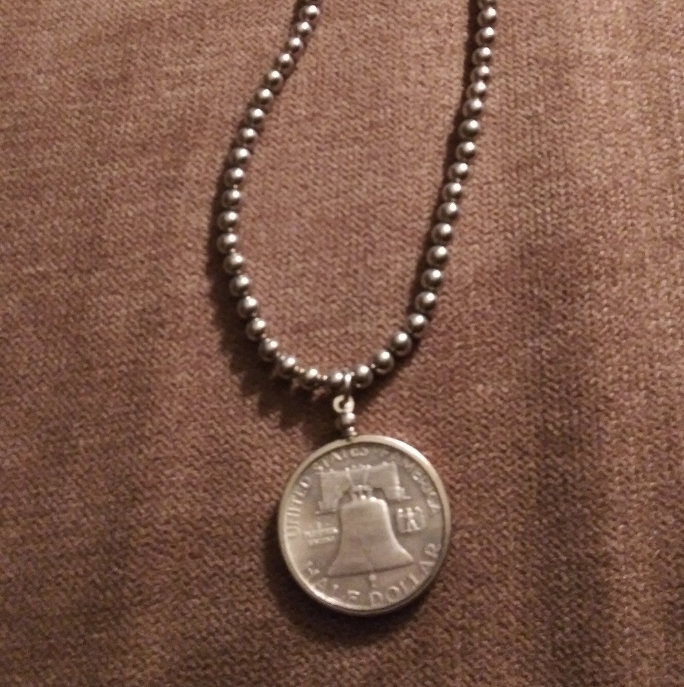 Silver half dollar pendant and sterling silver nec